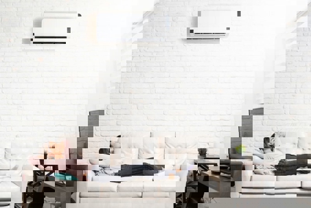 a woman sleeping on her couch