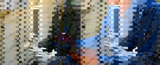 Technician checking on heating