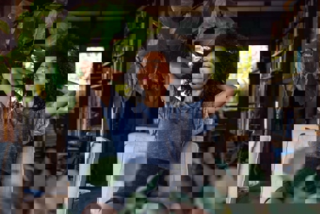 a woman is relaxing in her living room